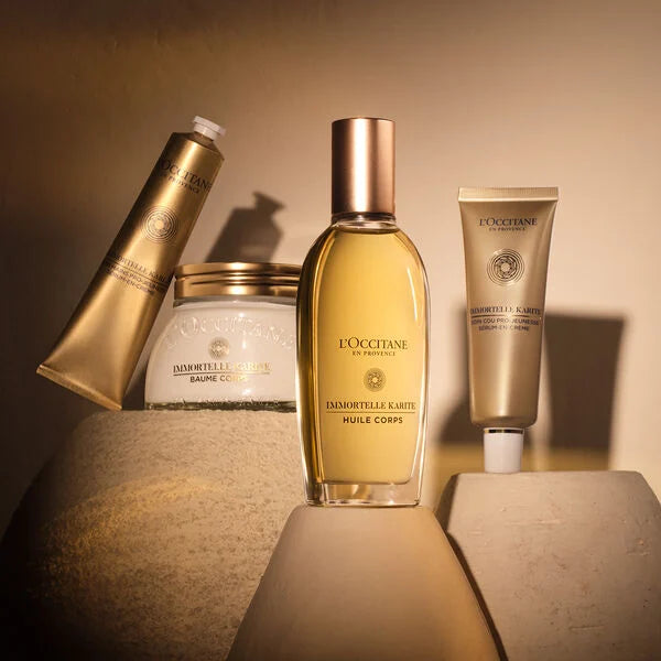 izdelki L'Occitane Immortele kolekcija za nego kože z zlatim ozadjem