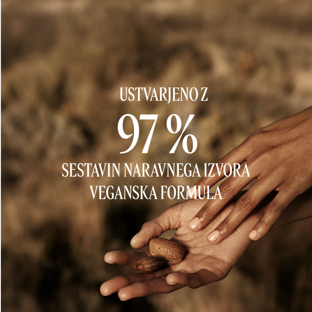 Roke, ki držijo mandljeve oreščke. Dodana je statistika Amande Sublime - L'Occitane