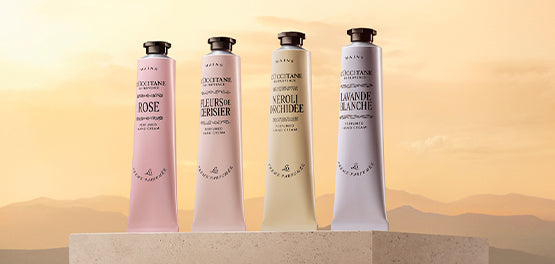 Dišavne kreme za roke L’Occitane za prefinjeno odišavljene in mehke roke – štiri tube v pastelnih barvah 