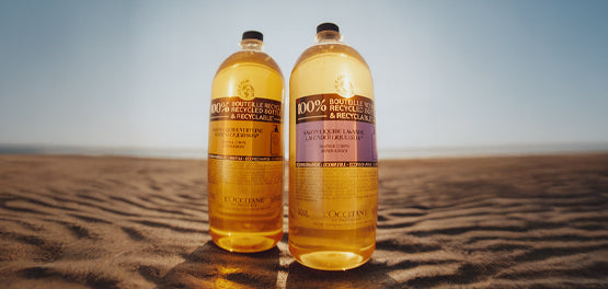 L’Occitanovi embalaži za ponovno polnjenje na peščeni plaži – refili šampon za lase in gel za prhanje 