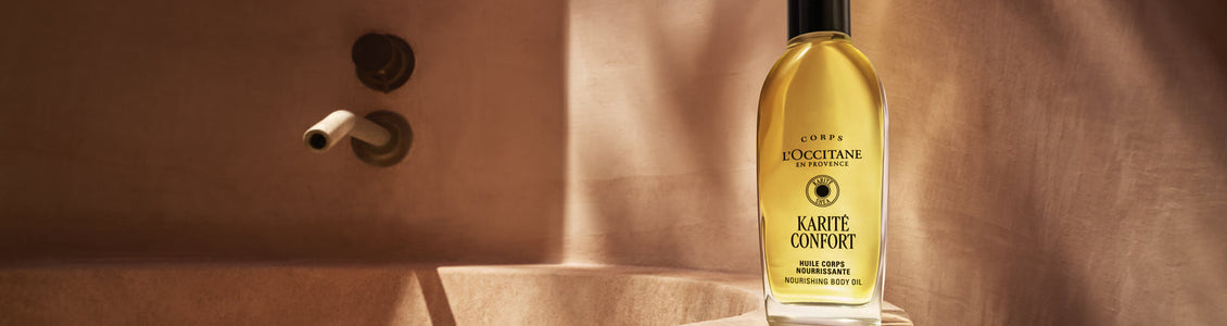 Hranilno olje za telo Karité Confort L'Occitane na robu kadi