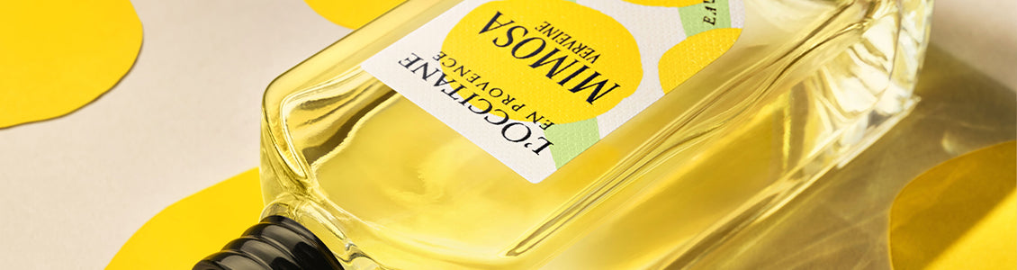 Steklenička Eau de Toilette Mimosa Verveine – L’Occitane, ležeče postavljena