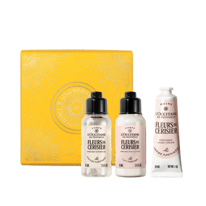 Mali darilni komplet Fleurs de Cerisier - prhanje, mleko za telo in nega rok L'Occitane