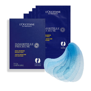 Posamezne vrečke izdelka Žlahtni obliži za kožo pod očmi L'Occitane in razstavljeni obliži