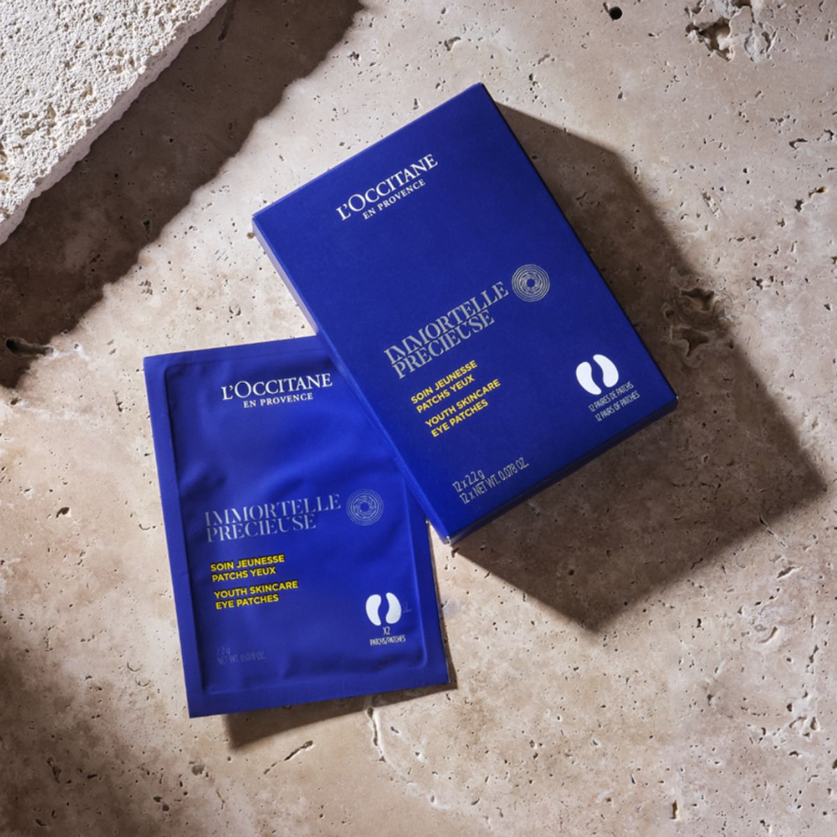 Embalaža izdelka Žlahtni obliži za kožo pod očmi L'Occitane